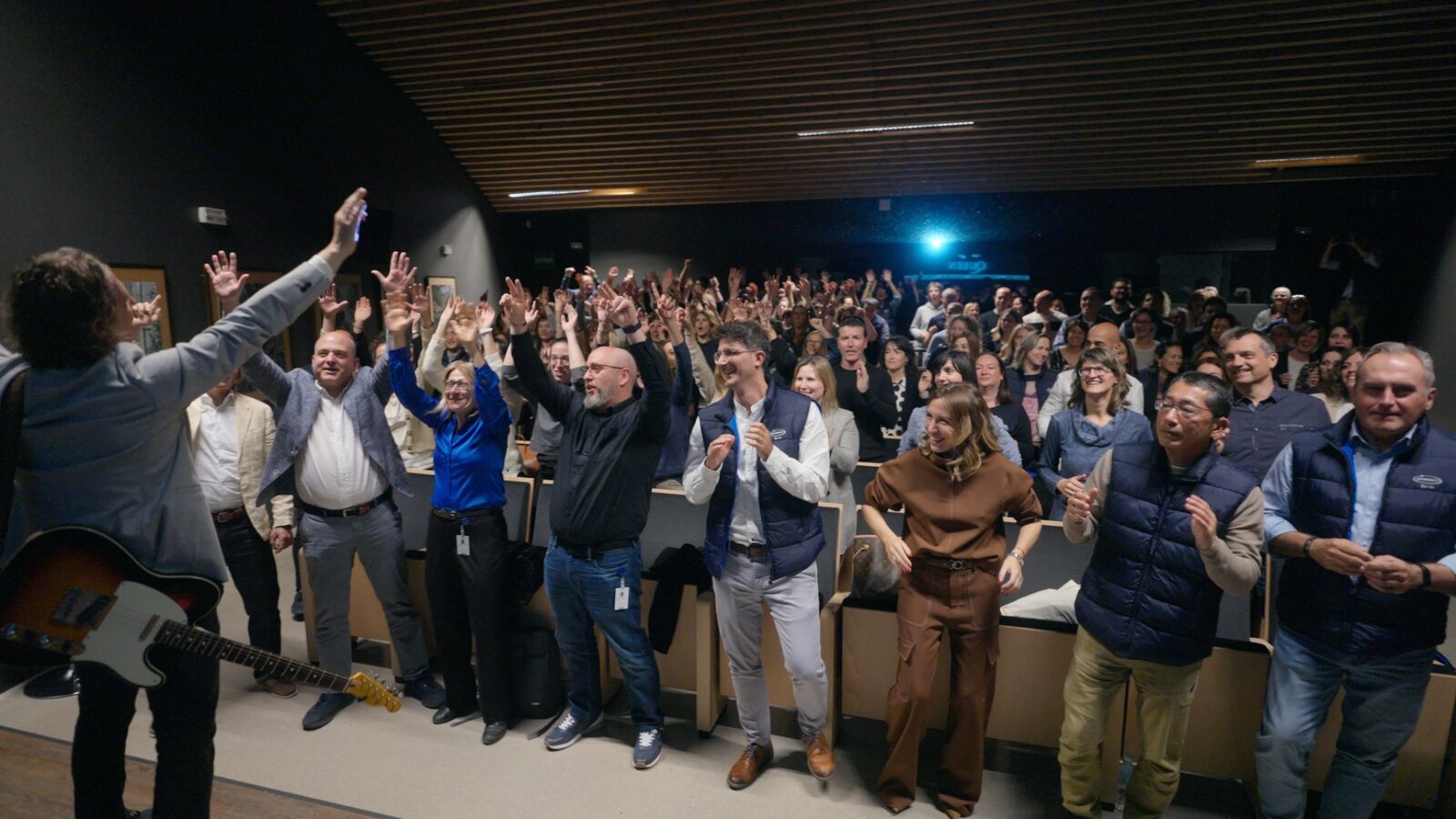 SalvaROCK celebrating with a corporate audience