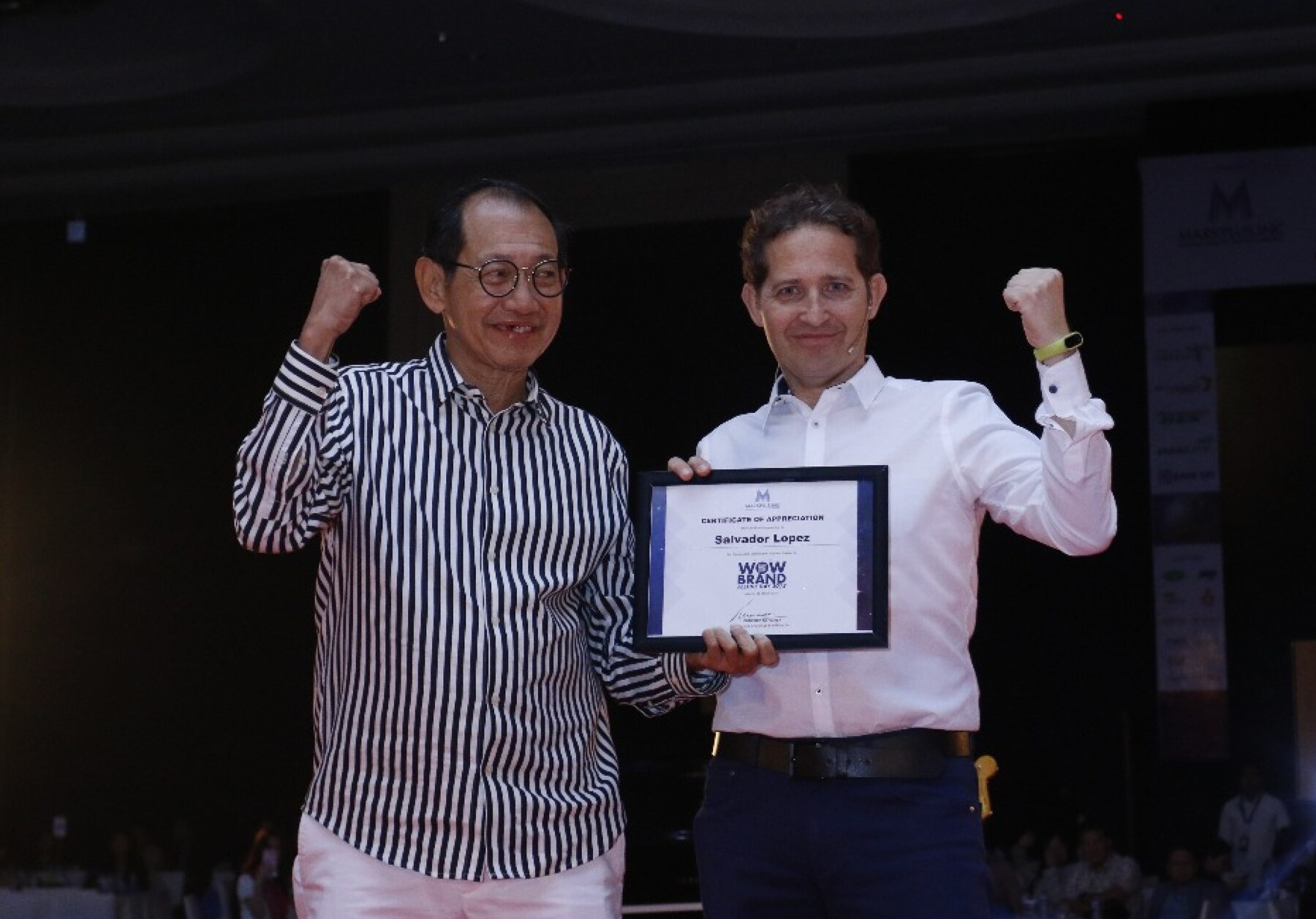 Hermawan Kartajaya presenting SalvaROCK with a certificate of appreciation in Jakarta