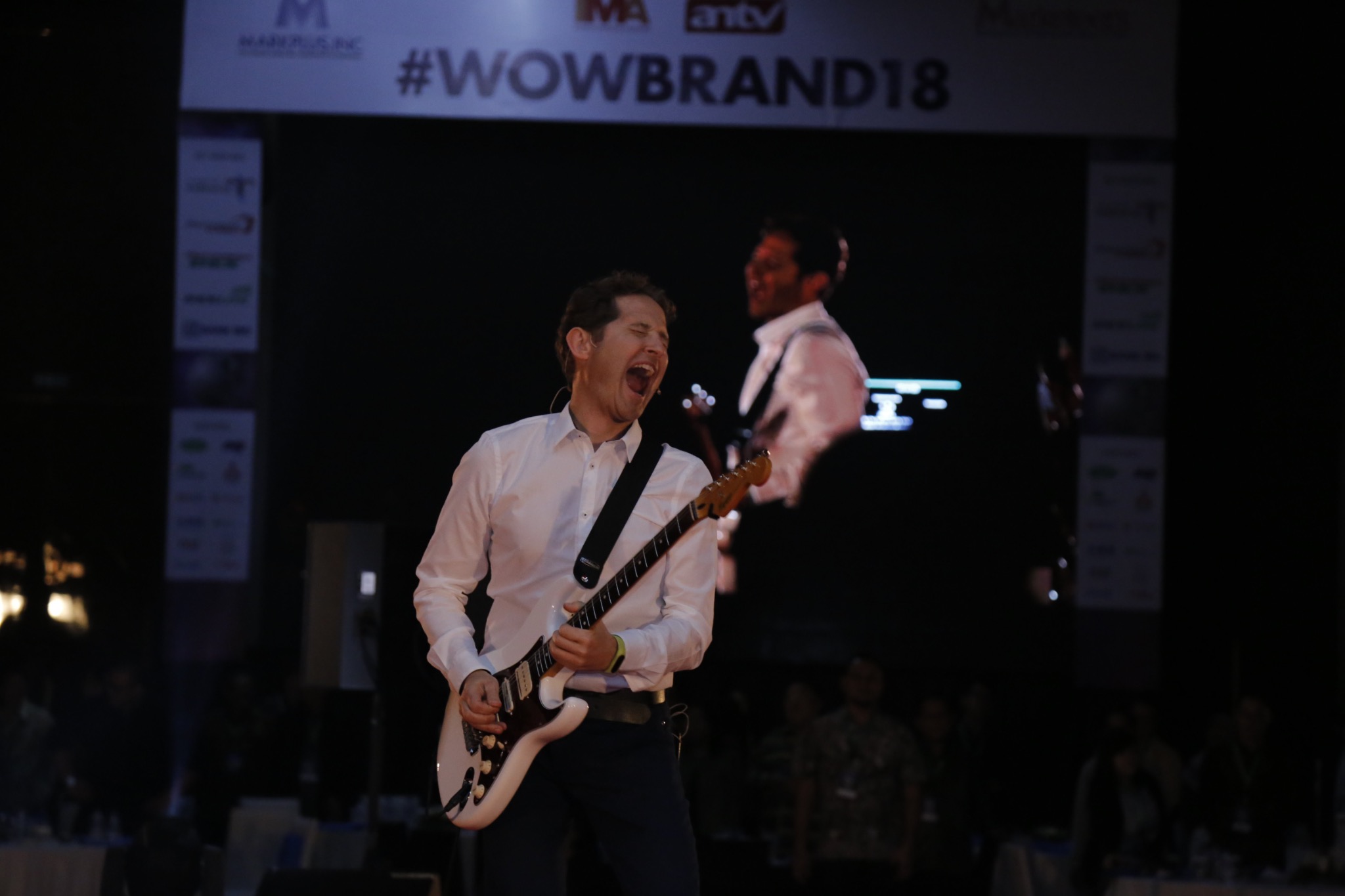 SalvaROCK performing with electric guitar on stage in Jakarta